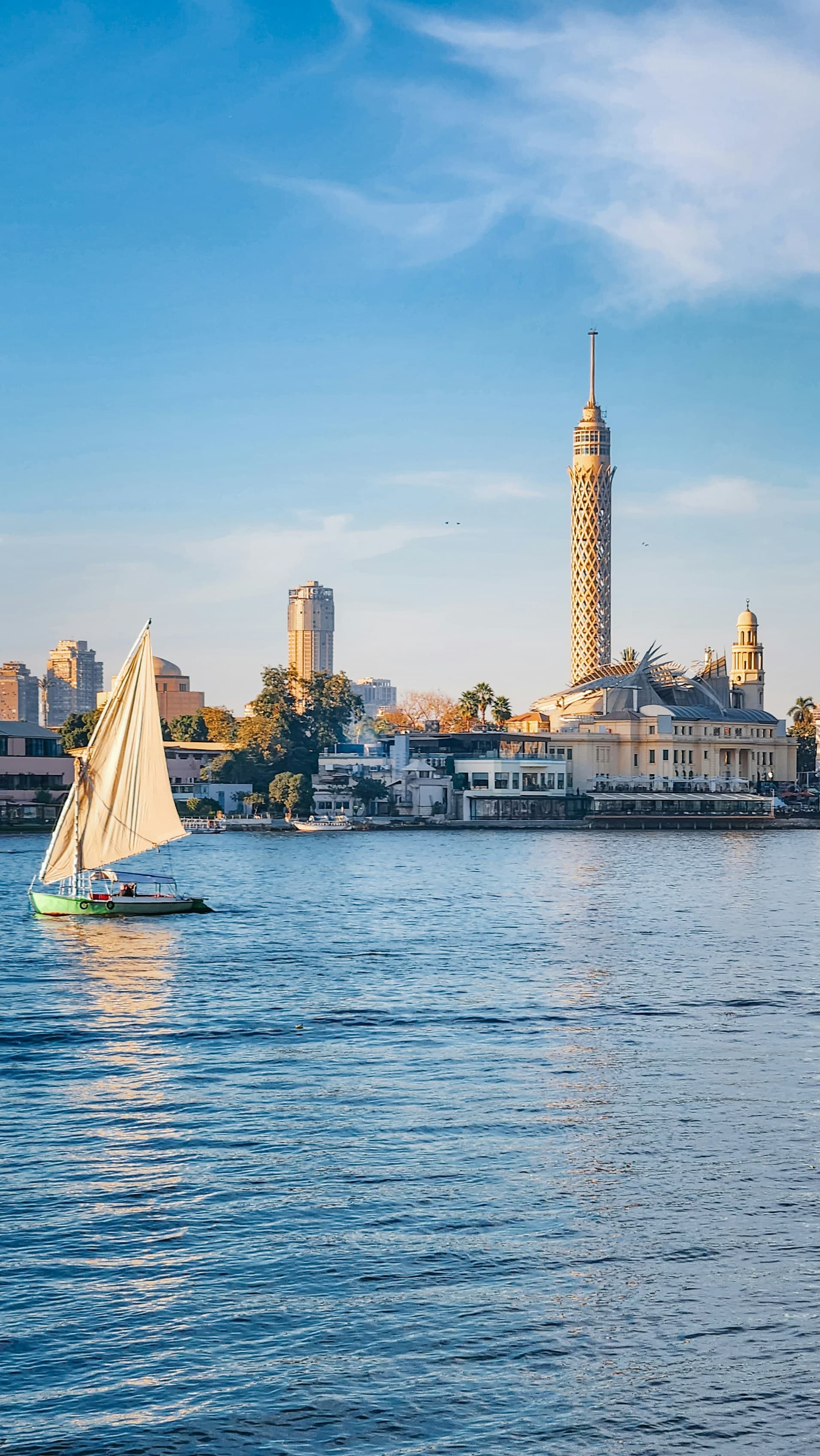 Felucca sailing on the Nile at dusk